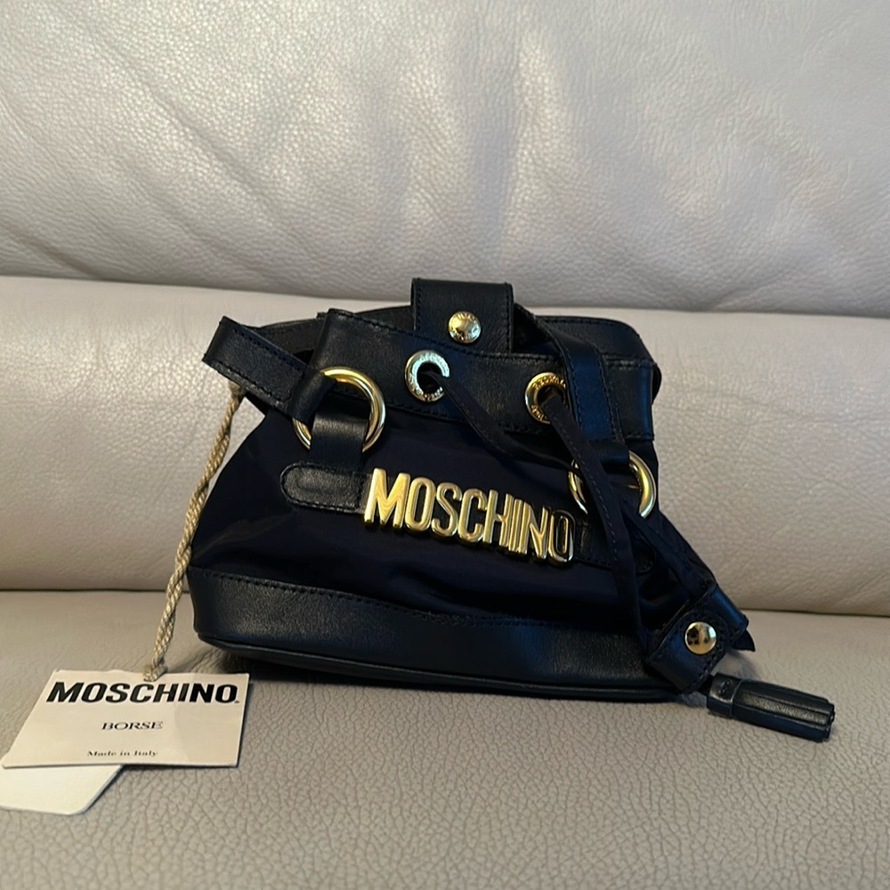 Moschino bag with  fabric nylon and leather trimming.